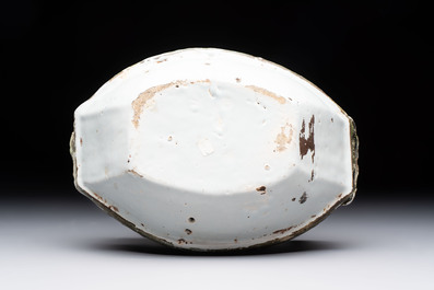 A cold-painted white Dutch Delft 'rowing boat' group, 18th C.
