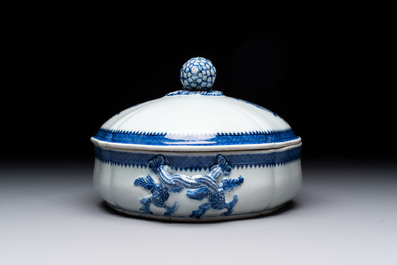 A set of two Chinese blue and white armorial dishes, a stand, and a tureen with the arms of Hughes for the English market, Qianlong, ca. 1790