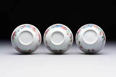 Eleven Chinese famille rose cups and nine saucers, Yongzheng/Qianlong