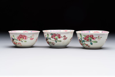 Eleven Chinese famille rose cups and nine saucers, Yongzheng/Qianlong