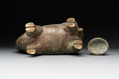 A rare Chinese inscribed bronze tapir-form vessel and cover, 'xizun 犧尊', late Ming/early Qing