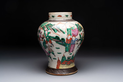 Two Chinese Nanking famille verte covered vases and a famille rose vase, 19th C.