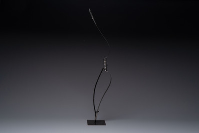 An Indo-Persian steel ceremonial bow or 'arc en acier' with silver koftgari inlay, 18/19th C.