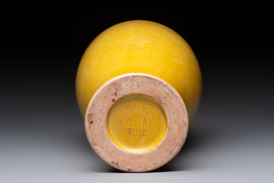 A Chinese yellow-glazed 'meiping' vase with incised design, Kangxi mark, 19th C.