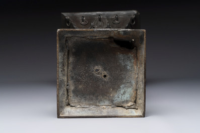 A large Chinese bronze quadrangular 'gu' vase with hanging rings, Ming