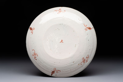 A polychrome Dutch Delft chinoiserie plate, first quarter 18th C.