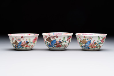 Eleven Chinese famille rose cups and nine saucers, Yongzheng/Qianlong