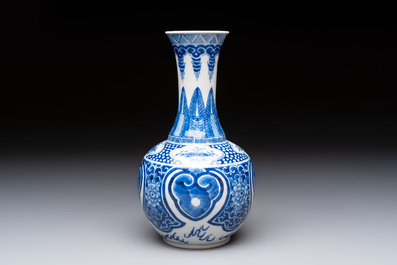 A Chinese blue and white vase with floral design, 19th C.