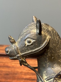 A rare Chinese partly gilt-lacquered bronze horse-from incense holder, Yuan/early Ming