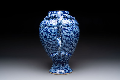 A rare large Nevers white-splashed blue-ground rope twist handled vase with '&agrave; la bougie' decor, France, 17th C.
