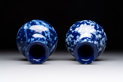 A pair of Nevers white-splashed blue-ground '&agrave; la bougie' vases, France, late 17th C.