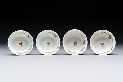 Seven Chinese famille rose cups and eleven saucers with floral design, Qianlong