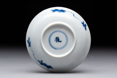 Three Chinese blue and white teapots, a cup and a saucer, Kangxi