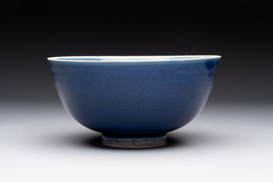 A pair of Chinese blue-glazed 'Hatcher Cargo' shipwreck bowls with incised dragons, Transitional period