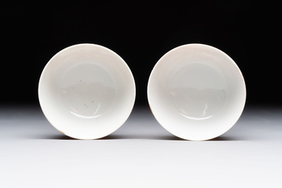 A Chinese iron-red-decorated 'Deer Hunting' bowl and two cups, Qianlong