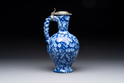 A rare Nevers pewter-mounted white-splashed blue-ground '&agrave; la bougie' ewer with rope twist handle, France, late 17th C.