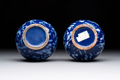 A pair of Nevers white-splashed blue-ground '&agrave; la bougie' vases, France, late 17th C.
