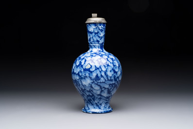 A rare Nevers pewter-mounted white-splashed blue-ground '&agrave; la bougie' ewer with rope twist handle, France, late 17th C.