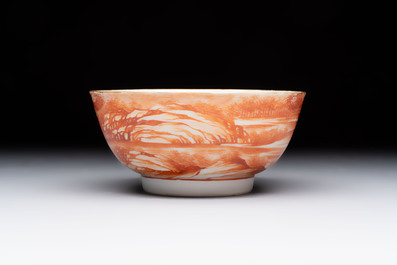 A Chinese iron-red-decorated 'Deer Hunting' bowl and two cups, Qianlong