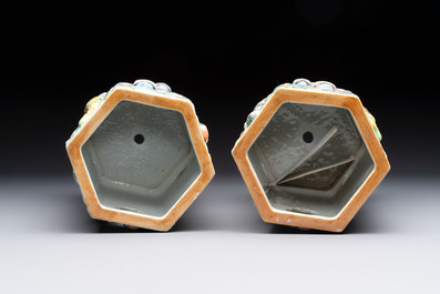 A pair of Chinese famille rose relief-moulded reticulated 'antiquities' hat stands, 19th C.