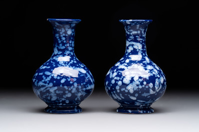 A pair of Nevers white-splashed blue-ground '&agrave; la bougie' vases, France, late 17th C.
