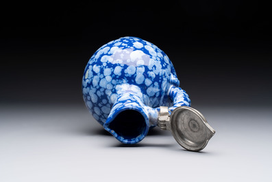 A rare Nevers pewter-mounted white-splashed blue-ground '&agrave; la bougie' ewer with rope twist handle, France, late 17th C.