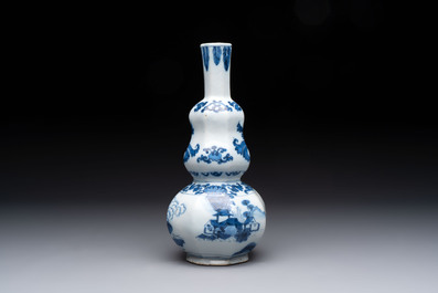 A blue and white Dutch Delft double gourd chinoiserie vase, 17th C.