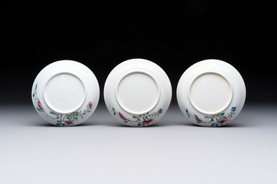 Seven Chinese famille rose cups and eleven saucers with floral design, Qianlong
