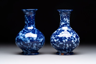 A pair of Nevers white-splashed blue-ground '&agrave; la bougie' vases, France, late 17th C.
