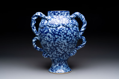 A rare large Nevers white-splashed blue-ground rope twist handled vase with '&agrave; la bougie' decor, France, 17th C.