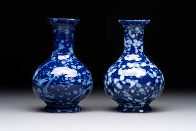 A pair of Nevers white-splashed blue-ground '&agrave; la bougie' vases, France, late 17th C.