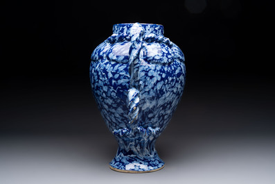 A rare large Nevers white-splashed blue-ground rope twist handled vase with '&agrave; la bougie' decor, France, 17th C.