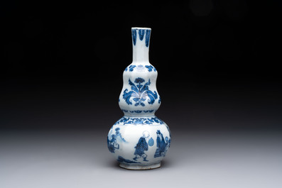 A blue and white Dutch Delft double gourd chinoiserie vase, 17th C.