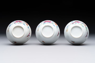 Seven Chinese famille rose cups and eleven saucers with floral design, Qianlong