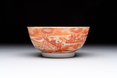 A Chinese iron-red-decorated 'Deer Hunting' bowl and two cups, Qianlong