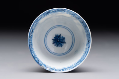 Three Chinese blue and white teapots, a cup and a saucer, Kangxi