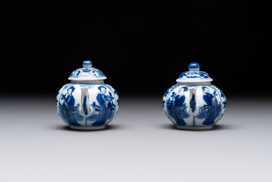 Three Chinese blue and white teapots, a cup and a saucer, Kangxi
