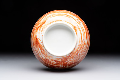 A Chinese iron-red-decorated 'Deer Hunting' bowl and two cups, Qianlong