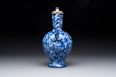 A rare Nevers pewter-mounted white-splashed blue-ground '&agrave; la bougie' ewer with rope twist handle, France, late 17th C.