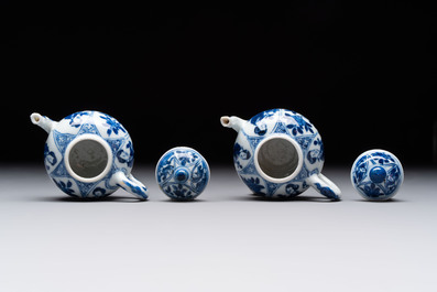 Three Chinese blue and white teapots, a cup and a saucer, Kangxi