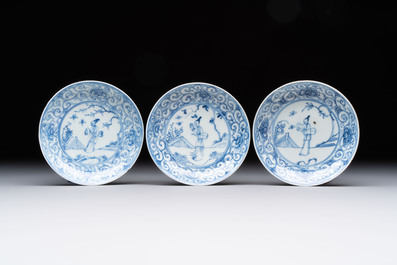 Ten Chinese blue and white cups and eleven saucers, Kangxi