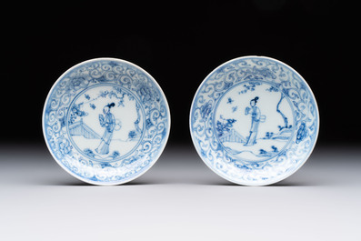 Ten Chinese blue and white cups and eleven saucers, Kangxi