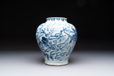 A Chinese blue and white 'dragon' vase, Transitional period