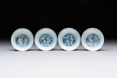 Ten Chinese blue and white cups and eleven saucers, Kangxi
