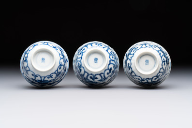 A set of six Chinese blue and white cups and saucers with floral design, Kangxi