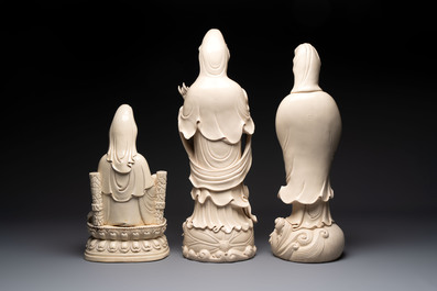 Three large Chinese Dehua blanc de Chine figures of Guanyin, He Chaozong 何朝宗 marks, 20th C.