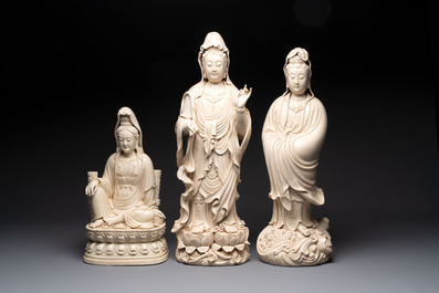 Three large Chinese Dehua blanc de Chine figures of Guanyin, He Chaozong 何朝宗 marks, 20th C.
