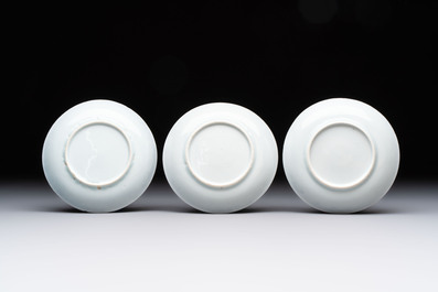 Ten Chinese blue and white cups and eleven saucers, Kangxi