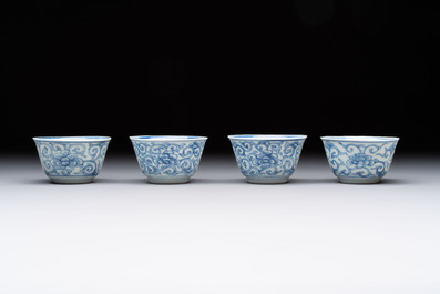 Ten Chinese blue and white cups and eleven saucers, Kangxi