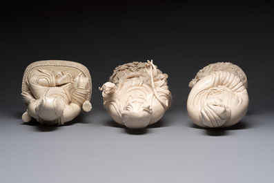 Three large Chinese Dehua blanc de Chine figures of Guanyin, He Chaozong 何朝宗 marks, 20th C.